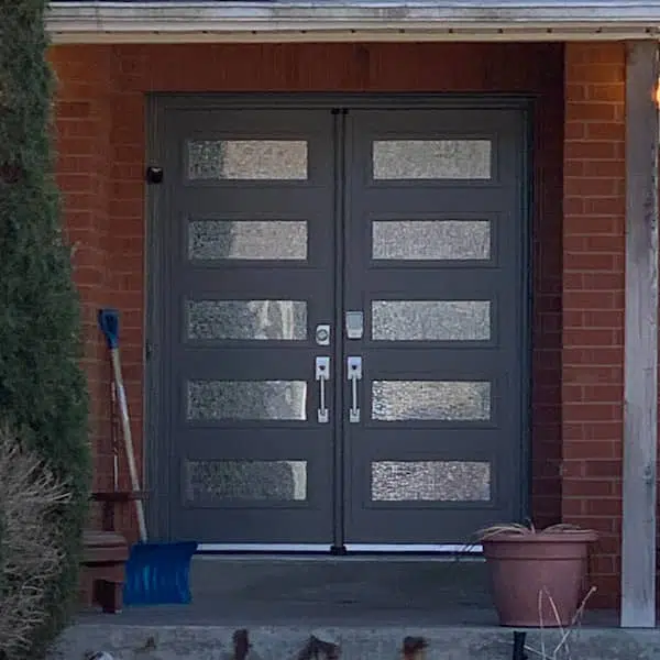 Architectural mahogany-look fiberglass front door with contemporary frosted privacy sidelite