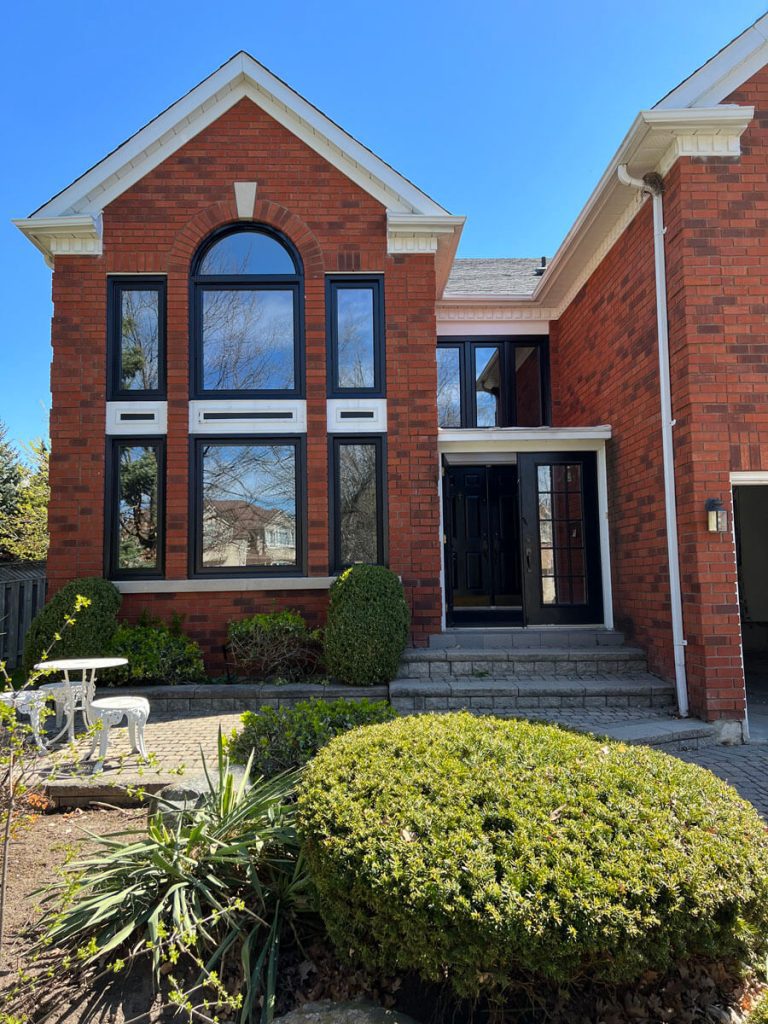After: Contemporary high-efficiency architectural black windows with panoramic uninterrupted glass
